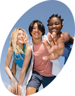 Three people posing together with a blue background